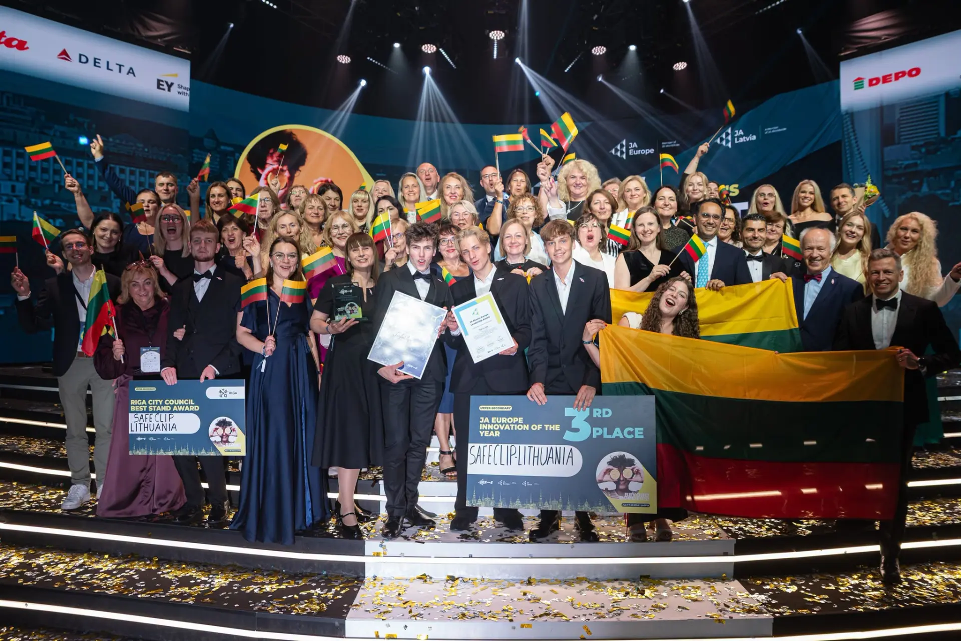 Lithuanian delegation celebrating on stage at the JA Europe awards ceremony